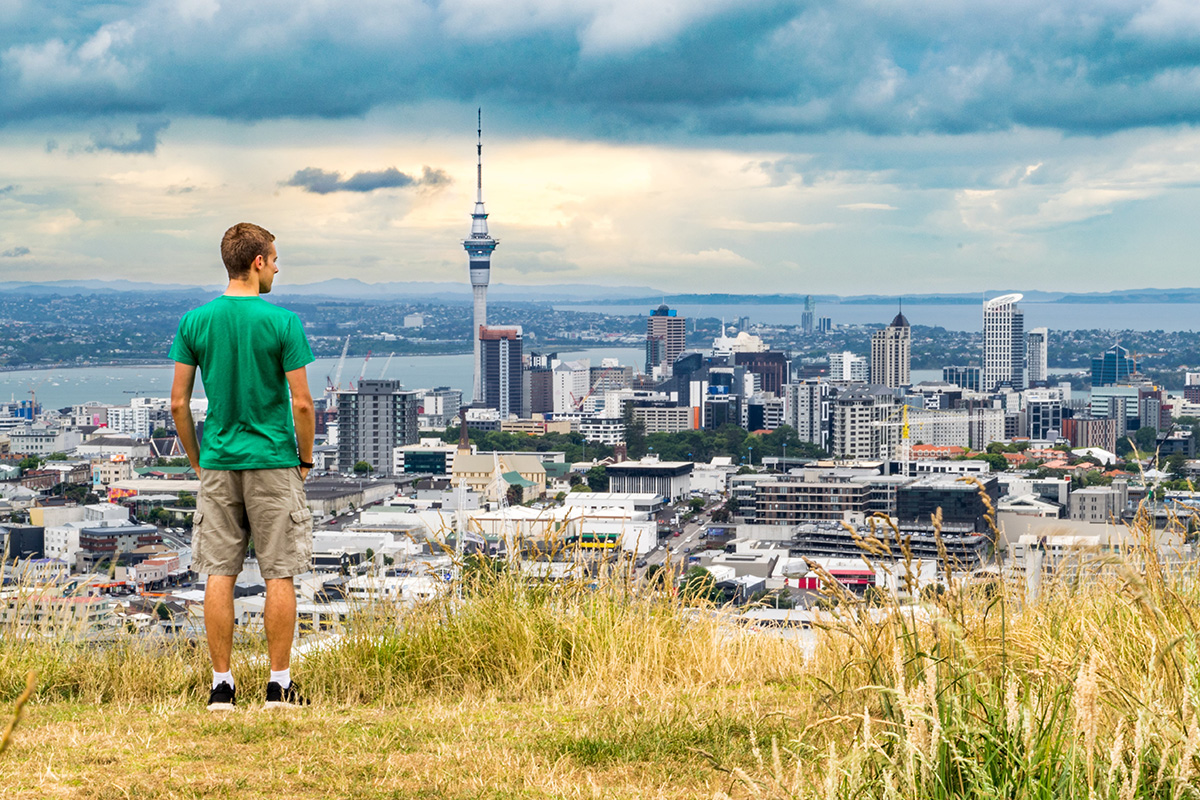 man looking over Auckland city