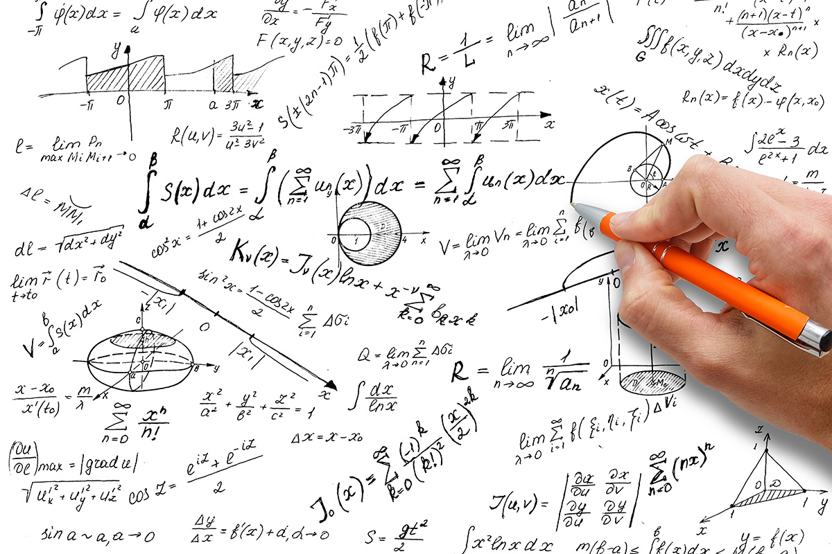 person writing complicated mathematical equations