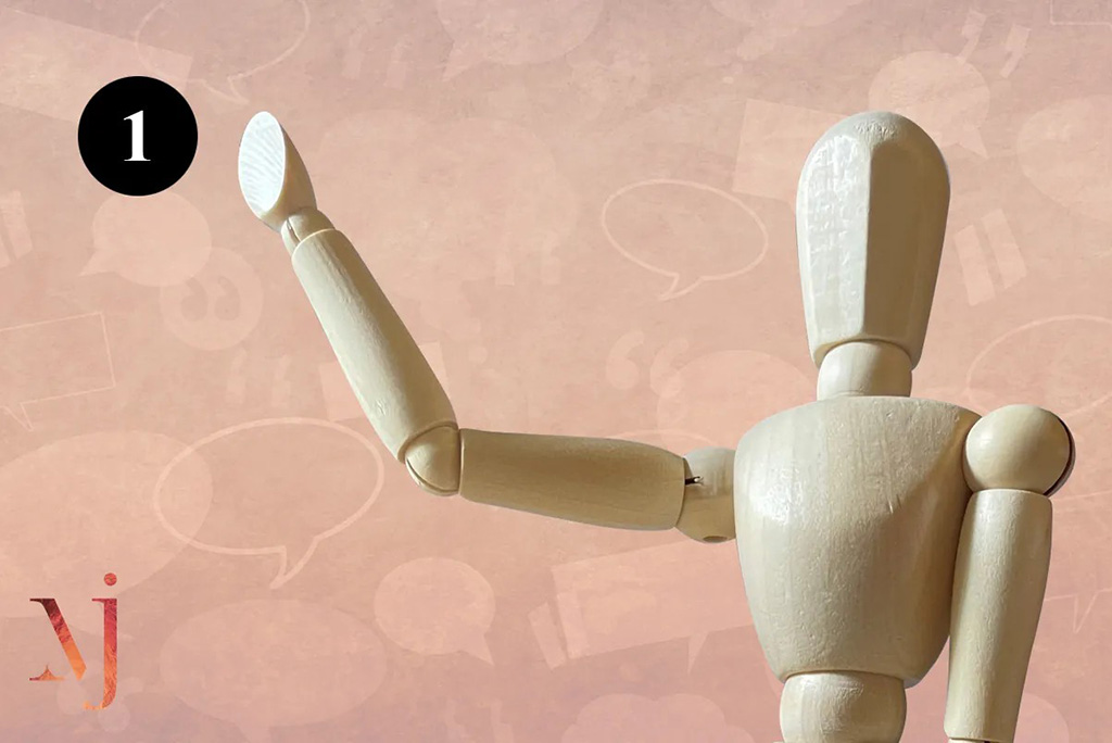 wooden mannequin waving