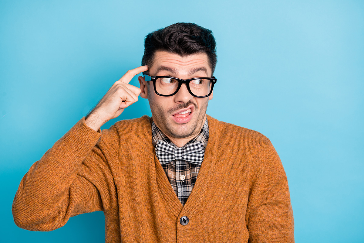 man scratching his head, confused