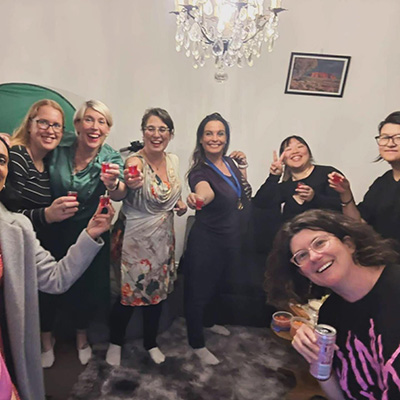 Lisa celebrating with skating friends