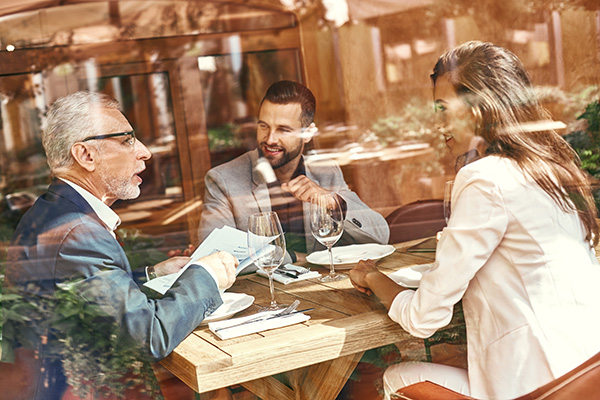 group of business people  having a meeting in a restaurant